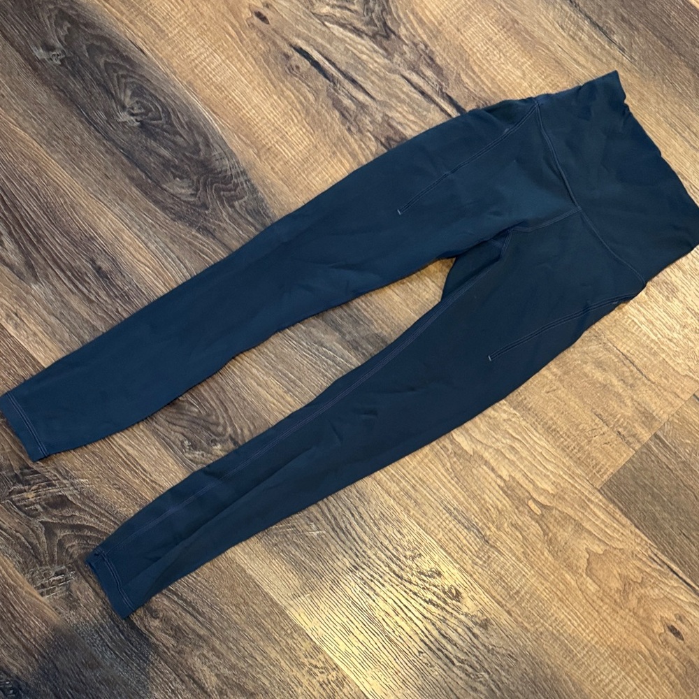 lululemon athletica Deep Blue Wunder train with pockets . 25 inch length